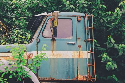 Rusty metal container in abandoned train