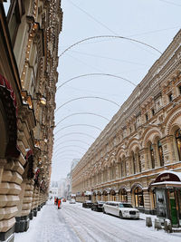 View of buildings in city during winter