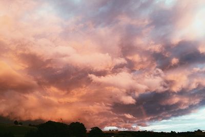 Scenic view of dramatic sky during sunset