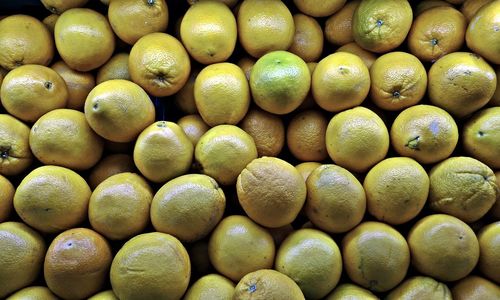 Full frame shot of lemons for sale at market stall