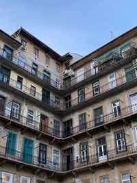 Low angle view of residential building against sky