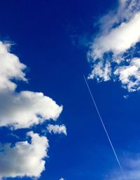 Low angle view of vapor trail in sky