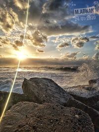 Scenic view of sea against sky at sunset