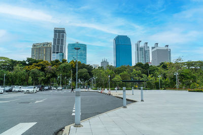 View of benjakitti forest park, is new landmark public park of central bangkok with sunset skyline.