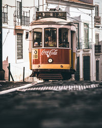 Train on railroad track in city