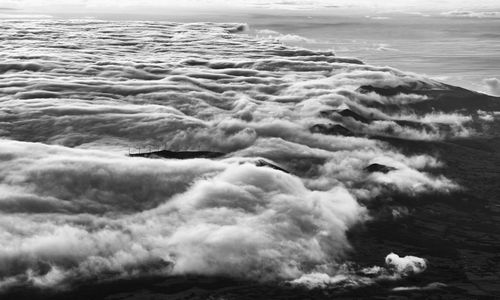 Close-up of waves in sea against sky