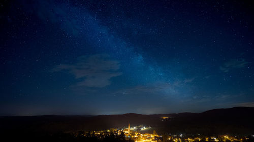 Scenic view of illuminated star field against sky at night