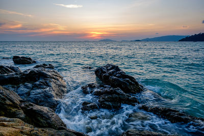 Scenic view of sea against sky during sunset