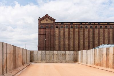 View of historical building against cloudy sky