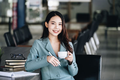 Young woman using mobile phone