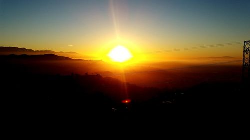 Scenic view of mountains at sunset