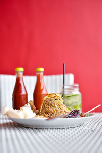 Close-up of food served on table