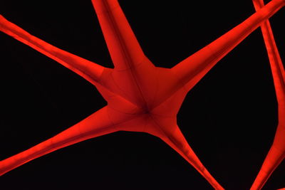 Directly below shot of illuminated lighting equipment against black background