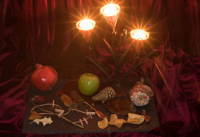 Close-up of illuminated fruits