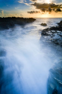 Scenic view of sea against sky during sunset