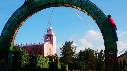 Low angle view of tower against clear blue sky