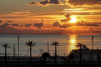 Scenic view of sunset over sea