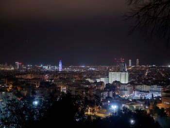 Illuminated buildings in city at night