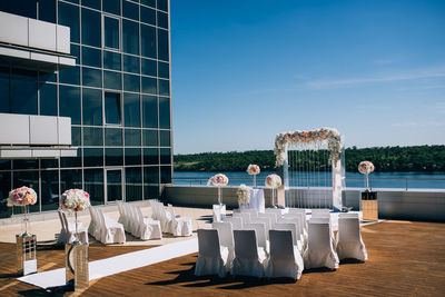 View of chairs arranged against sky