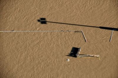 High angle view of shadow on water