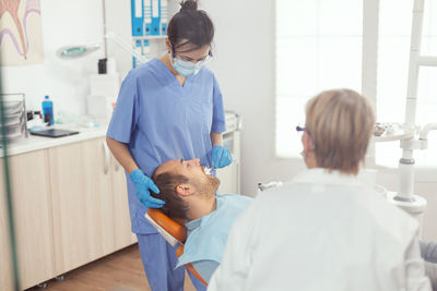 Man lying at dentist office