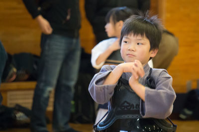 Cute boy practicing kendo