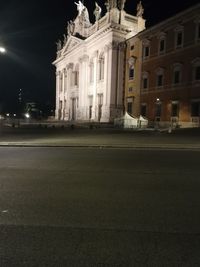 Buildings in city at night