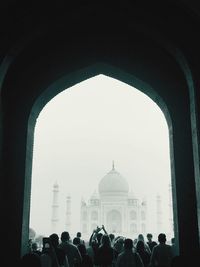 Group of people in front of historical building