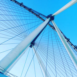 Low angle view of sailboat against clear blue sky