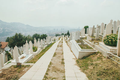 Panoramic view of cemetery against sky