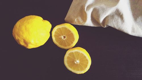 Close-up of oranges on table