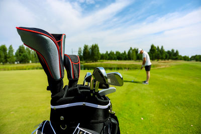 Rear view of man on golf course