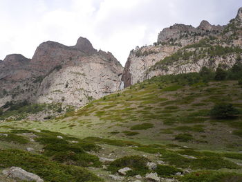 Scenic view of rocky mountains against sky