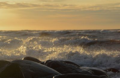 Scenic view of sea against sky during sunset