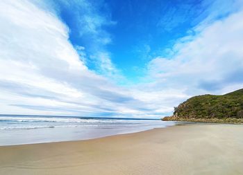 Scenic view of beach against sky