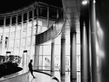 Silhouette of people in shopping mall