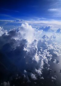 Low angle view of clouds in blue sky