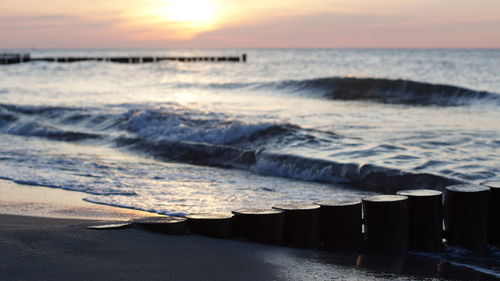 Scenic view of sea against sky during sunset