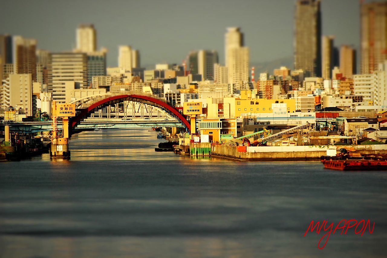 architecture, built structure, building exterior, city, transportation, river, bridge - man made structure, cityscape, connection, waterfront, water, city life, bridge, travel destinations, travel, mode of transport, famous place, incidental people, capital cities, tourism