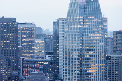 Modern cityscape against sky