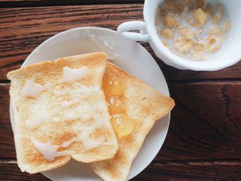 High angle view of breakfast served on table