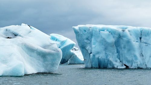 Scenic view of frozen sea against sky