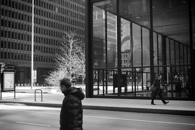 Woman standing in city