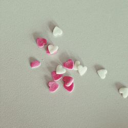 Close-up of red heart shape on table