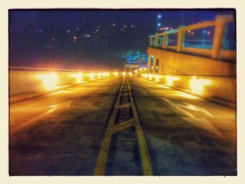 Illuminated street lights at night