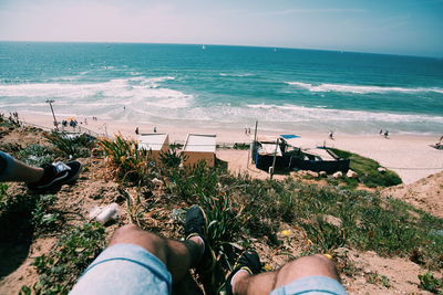 Low section of people on beach