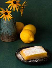 Close-up of yellow and orange on table