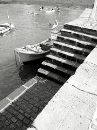 High angle view of boats moored on river