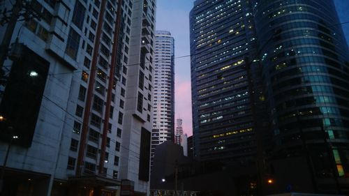 Low angle view of skyscrapers at night