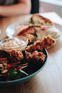 Close-up of food served on table